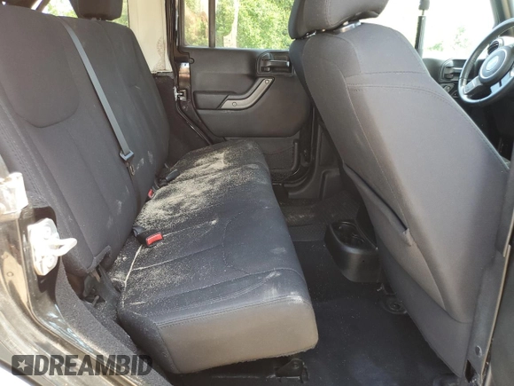 2018 Jeep Wrangler JK Unlimited Sport S with VIN 1C4BJWDG3JL906904, listed as a Copart auction lot 62789794 with 73,464 mi miles and Salvage Title. Bid and sale history available at carsss.com. Image 11.