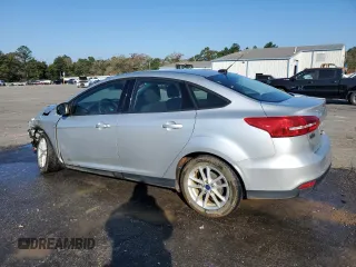 2017 Ford Focus SE with VIN 1FADP3F28HL315779, listed as a Copart auction lot 82608154 with 143,902 mi miles and Salvage title. Bid and sale history available at DreamBid. Image 2.