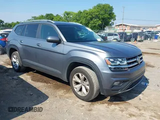 2019 Volkswagen Atlas SE with VIN 1V2WR2CA4KC620074, listed as a IAAI auction lot 42657399 with 75,306 mi miles and . Bid and sale history available at DreamBid. Image 1.