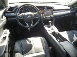 2020 Honda Civic EX-L z VIN 19XFC1F70LE209746, wystawiony jako Copart lot #52141315 z przebiegiem 84 387 mil mil oraz Szkoda całkowita • Salvage title. Historia ofert i sprzedaży dostępna na DreamBid. Obrazek 8.