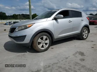 2011 Kia Sportage LX z VIN KNDPB3A24B7050422, wystawiony jako Copart lot #58639255 z przebiegiem 179 160 mil mil oraz Czysty tytuł • Clean title. Historia ofert i sprzedaży dostępna na DreamBid. Obrazek 1.