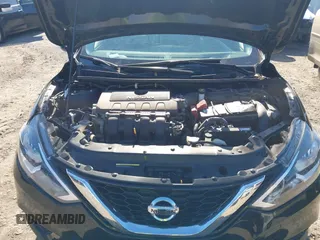 2019 Nissan Sentra S z VIN 3N1AB7AP1KY456992, wystawiony jako IAAI lot #41237654 z przebiegiem 88 099 mil mil oraz . Historia ofert i sprzedaży dostępna na DreamBid. Obrazek 10.