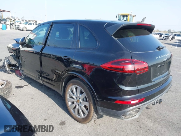 2017 Porsche Cayenne with VIN WP1AA2A29HKA86226, listed as a IAAI auction lot 40999976 with 55,883 mi miles. Bid and sale history available at carsss.com. Image 3.