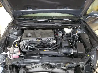 2025 Toyota Camry LE z VIN 4T1DAACK9SU506208, wystawiony jako Copart lot #56706605 z przebiegiem 17 651 mil mil oraz Szkoda całkowita • Salvage title. Historia ofert i sprzedaży dostępna na DreamBid. Obrazek 11.