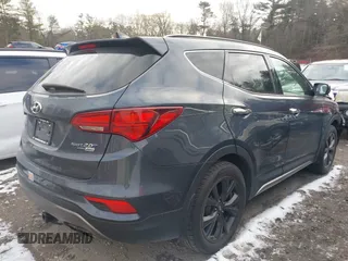 2017 Hyundai Santa Fe Ultimate with VIN 5NMZWDLA0HH045078, listed as a IAAI auction lot 41268809 with 100,659 mi miles and . Bid and sale history available at DreamBid. Image 4.