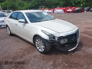 2014 Cadillac CTS Luxury RWD with VIN 1G6AR5SX4E0152617, listed as a IAAI auction lot 42365303 with 81,027 mi miles and . Bid and sale history available at DreamBid. Image 1.