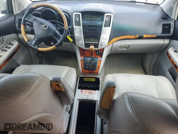 2007 Lexus RX 350 z VIN 2T2GK31U67C023595, wystawiony jako Copart lot #61021985 z przebiegiem 399 172 mil mil oraz Czysty tytuł • Clean title. Historia ofert i sprzedaży dostępna na DreamBid. Obrazek 8.