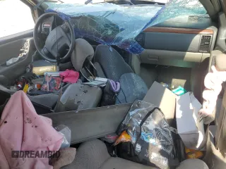 1999 Jeep Grand Cherokee Laredo с VIN 1J4G258S9XC758711, выставлен на аукционе Copart как лот 58420835 с пробегом Не указан миль и Списание • Salvage title. История ставок и продаж доступна на DreamBid. Изображение 8.