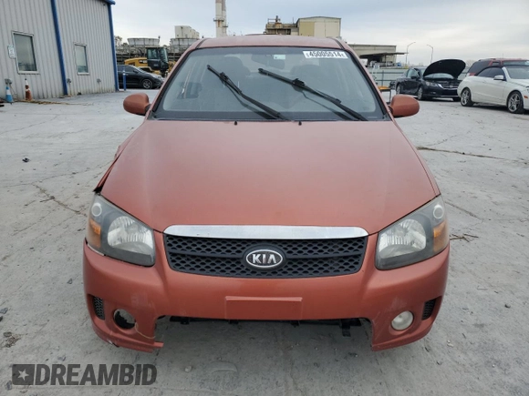 2009 Kia Spectra SX with VIN KNAFE221095026589, listed as a Copart auction lot 45005514 with 203,779 mi miles and Salvage Title. Bid and sale history available at carsss.com. Image 5.