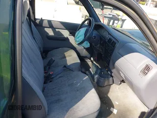 1999 Toyota Tacoma with VIN 4TANL42N7XZ481489, listed as a IAAI auction lot 40365153 with 218,971 mi miles. Bid and sale history available at carsss.com. Image 5.