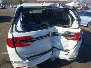 2024 Honda Odyssey Elite with VIN 5FNRL6H90RB028139, listed as a IAAI auction lot 41666330 with 8,516 mi miles and . Bid and sale history available at DreamBid. Image 6.