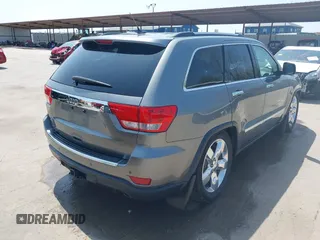 2013 Jeep Grand Cherokee Overland with VIN 1C4RJFCG2DC611877, listed as a IAAI auction lot 41910800 with 151,457 mi miles. Bid and sale history available at carsss.com. Image 4.