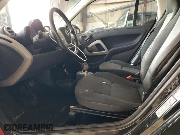 2015 Smart fortwo Passion with VIN WMEEJ3BA0FK797374, listed as a Copart auction lot 64472605 with 135,576 mi miles and Clean title. Bid and sale history available at DreamBid. Image 7.