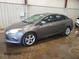 2013 Ford Focus SE with VIN 1FADP3F23DL330572, listed as a Copart auction lot 63995595 with 124,687 mi miles and Salvage title. Bid and sale history available at DreamBid. Image 1.