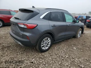 2021 Ford Escape SE with VIN 1FMCU9G64MUB16148, listed as a Copart auction lot 60994595 with 7,772 mi miles and Salvage title. Bid and sale history available at DreamBid. Image 3.