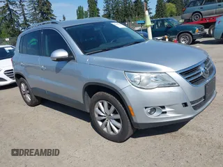 2011 Volkswagen Tiguan SE with VIN WVGBV7AX7BW529097, listed as a IAAI auction lot 42182690 with 139,878 mi miles and . Bid and sale history available at DreamBid. Image 1.