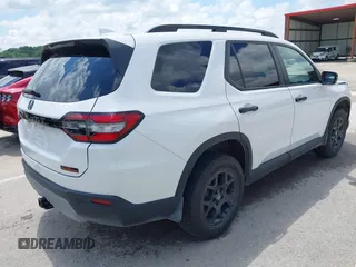 2024 Honda Pilot TrailSport z VIN 5FNYG1H6XRB004763, wystawiony jako IAAI lot #42237606 z przebiegiem 14 819 mil mil oraz . Historia ofert i sprzedaży dostępna na DreamBid. Obrazek 4.