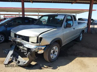 2000 Nissan Frontier XE with VIN 1N6DD26S9YC335405, listed as a IAAI auction lot 42342966 with 134,192 mi miles and . Bid and sale history available at DreamBid. Image 2.