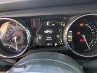2023 Jeep Wrangler Sahara with VIN 1C4JJXP65PW661194, listed as a Copart auction lot 55729925 with 24,264 mi miles and Clean Title. Bid and sale history available at DreamBid. Image 9.