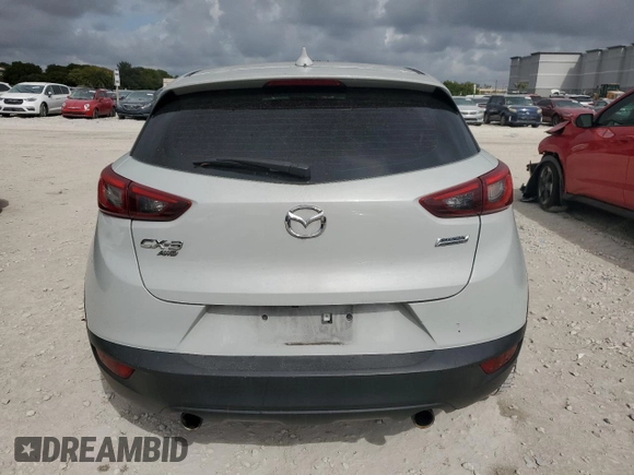 2017 Mazda CX-3 Grand Touring with VIN JM1DKFD76H0170333, listed as a Copart auction lot 43772595 with 59,693 mi miles and Salvage Title. Bid and sale history available at carsss.com. Image 6.
