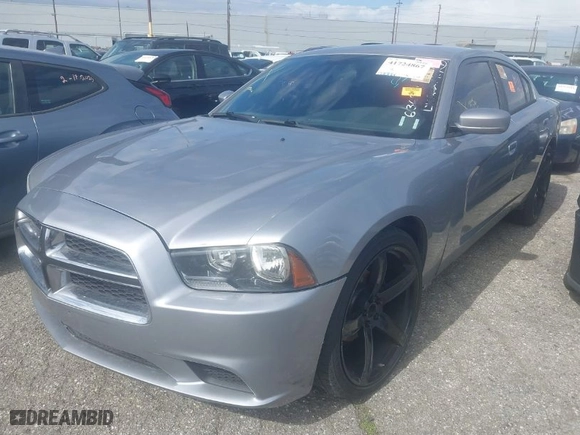 2013 Dodge Charger SE with VIN 2C3CDXBG7DH636909, listed as a IAAI auction lot 41724867 with NaN miles. Bid and sale history available at carsss.com. Image 2.