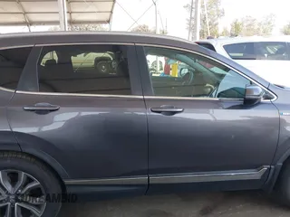 2020 Honda CR-V Touring z VIN 7FART6H91LE000684, wystawiony jako IAAI lot #42504731 z przebiegiem 49 100 mil mil oraz . Historia ofert i sprzedaży dostępna na DreamBid. Obrazek 13.