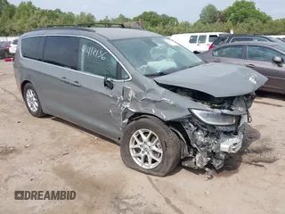 2022 Chrysler Pacifica Touring L with VIN 2C4RC1BG9NR142830, listed as a IAAI auction lot 42412136 with 104,964 mi miles and . Bid and sale history available at DreamBid. Image 1.