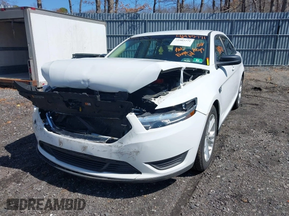 2015 Ford Taurus SE with VIN 1FAHP2D80FG176157, listed as a IAAI auction lot 41985771 with 102,252 mi miles and . Bid and sale history available at carsss.com. Image 2.