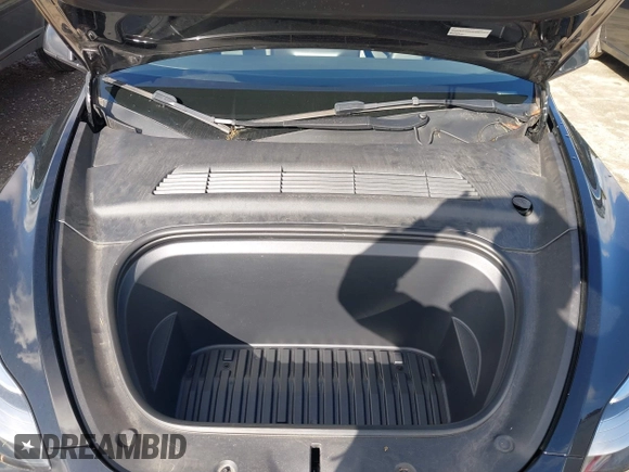 2022 Tesla Model Y Long Range with VIN 7SAYGDEEXNF459834, listed as a IAAI auction lot 42004576 with 56,175 mi miles and . Bid and sale history available at carsss.com. Image 10.