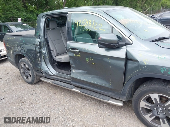 2018 Honda Ridgeline RTL-T with VIN 5FPYK3F61JB013733, listed as a IAAI auction lot 42548122 with 92,407 mi miles and . Bid and sale history available at DreamBid. Image 6.
