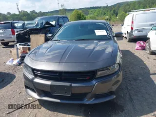 2018 Dodge Charger SXT Plus with VIN 2C3CDXHG9JH176400, listed as a IAAI auction lot 42128281 with 198,766 mi miles and . Bid and sale history available at carsss.com. Image 12.