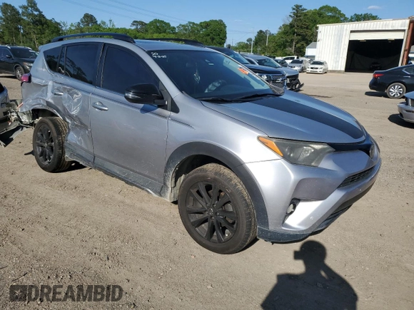 2018 Toyota RAV4 XLE with VIN 2T3RFREV5JW731373, listed as a Copart auction lot 51917465 with 124,623 mi miles and Salvage Title. Bid and sale history available at DreamBid. Image 4.