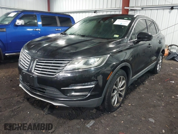 2015 Lincoln MKC with VIN 5LMCJ2A98FUJ17855, listed as a IAAI auction lot 41433416 with 113,070 mi miles. Bid and sale history available at carsss.com. Image 2.