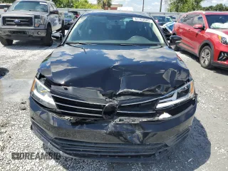 2015 Volkswagen Jetta SE z VIN 3VWD07AJ2FM296420, wystawiony jako Copart lot #61103085 z przebiegiem 72 579 mil mil oraz Szkoda całkowita • Salvage title. Historia ofert i sprzedaży dostępna na DreamBid. Obrazek 5.