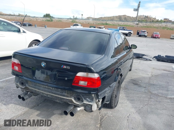 2001 BMW M5 z VIN WBSDE93421BZ99483, wystawiony jako IAAI lot #41892842 z przebiegiem 134 689 mil mil oraz . Historia ofert i sprzedaży dostępna na DreamBid. Obrazek 4.