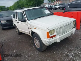 1996 Jeep Cherokee z VIN 1J4FN78S7TL211770, wystawiony jako IAAI lot #42359988 z przebiegiem 246 840 mil mil oraz . Historia ofert i sprzedaży dostępna na DreamBid. Obrazek 1.