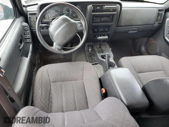 2000 Jeep Cherokee Classic with VIN 1J4FF58S8YL119611, listed as a Copart auction lot 57255685 with 148,908 mi miles and Clean title. Bid and sale history available at DreamBid. Image 8.