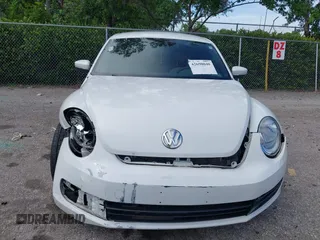 2015 Volkswagen Beetle Fleet Edition with VIN 3VWF17AT2FM656714, listed as a IAAI auction lot 42698040 with 72,348 mi miles and . Bid and sale history available at DreamBid. Image 6.