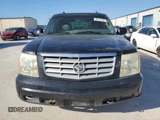 2003 Cadillac Escalade z VIN 1GYEC63T63R317510, wystawiony jako Copart lot #48515195 z przebiegiem 398 303 mil mil oraz Czysty tytuł • Clean title. Historia ofert i sprzedaży dostępna na DreamBid. Obrazek 5.