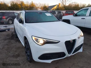 2023 Alfa Romeo Stelvio Ti with VIN ZASPAKBN3P7D66480, listed as a IAAI auction lot 41402886 with 17,034 mi miles. Bid and sale history available at carsss.com. Image 1.