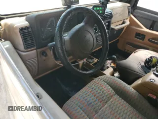 1997 Jeep Wrangler Sport with VIN 1J4FY19S8VP522719, listed as a Copart auction lot 70895314 with 174,536 mi miles and Clean Title. Bid and sale history available at carsss.com. Image 8.