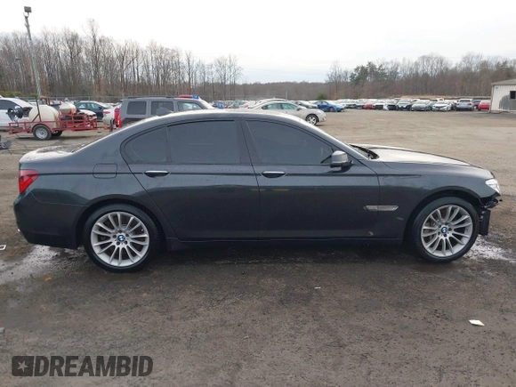 2015 BMW 7 Series 750i xDrive with VIN WBAYB6C56FG299238, listed as a IAAI auction lot 41441393 with 62,396 mi miles. Bid and sale history available at carsss.com. Image 14.