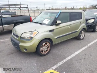 2011 Kia Soul + with VIN KNDJT2A25B7235950, listed as a IAAI auction lot 41378923 with 191,116 mi miles. Bid and sale history available at carsss.com. Image 2.