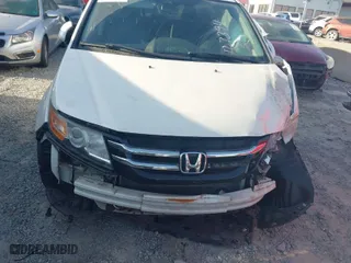 2016 Honda Odyssey Touring Elite with VIN 5FNRL5H98GB127394, listed as a IAAI auction lot 41828133 with 161,144 mi miles. Bid and sale history available at carsss.com. Image 6.