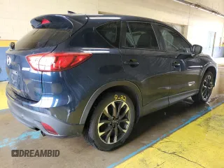 2016 Mazda CX-5 Grand Touring with VIN JM3KE4DY0G0813499, listed as a Copart auction lot 54174805 with 116,709 mi miles and Clean Title. Bid and sale history available at carsss.com. Image 3.