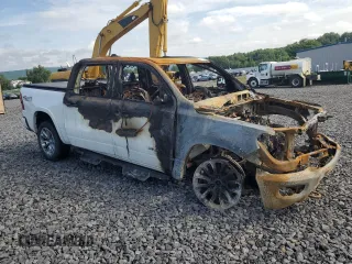 2020 Ram 1500 Laramie with VIN 1C6SRFJM9LN213594, listed as a Copart auction lot 61912715 with Not provided miles and Salvage title. Bid and sale history available at DreamBid. Image 4.