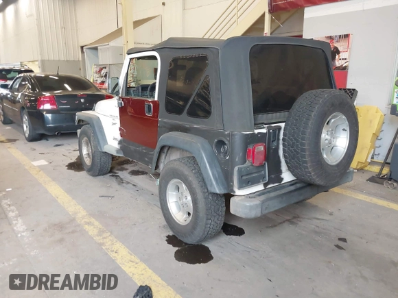 1999 Jeep Wrangler Sport with VIN 1J4FY19S6XP449014, listed as a IAAI auction lot 41893297 with 181,114 mi miles. Bid and sale history available at carsss.com. Image 3.