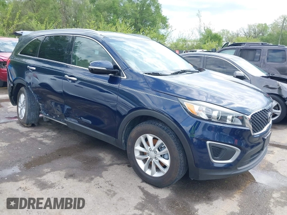 2017 Kia Sorento LX z VIN 5XYPG4A3XHG287217, wystawiony jako IAAI lot #42067077 z przebiegiem 112 324 mil mil oraz . Historia ofert i sprzedaży dostępna na DreamBid. Obrazek 1.