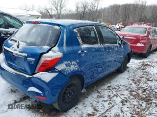 2014 Toyota Yaris L with VIN JTDKTUD34ED581773, listed as a IAAI auction lot 41620586 with 239,100 mi miles. Bid and sale history available at carsss.com. Image 4.