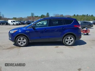 2016 Ford Escape SE with VIN 1FMCU9GX1GUB28870, listed as a IAAI auction lot 42129628 with 113,909 mi miles. Bid and sale history available at carsss.com. Image 14.